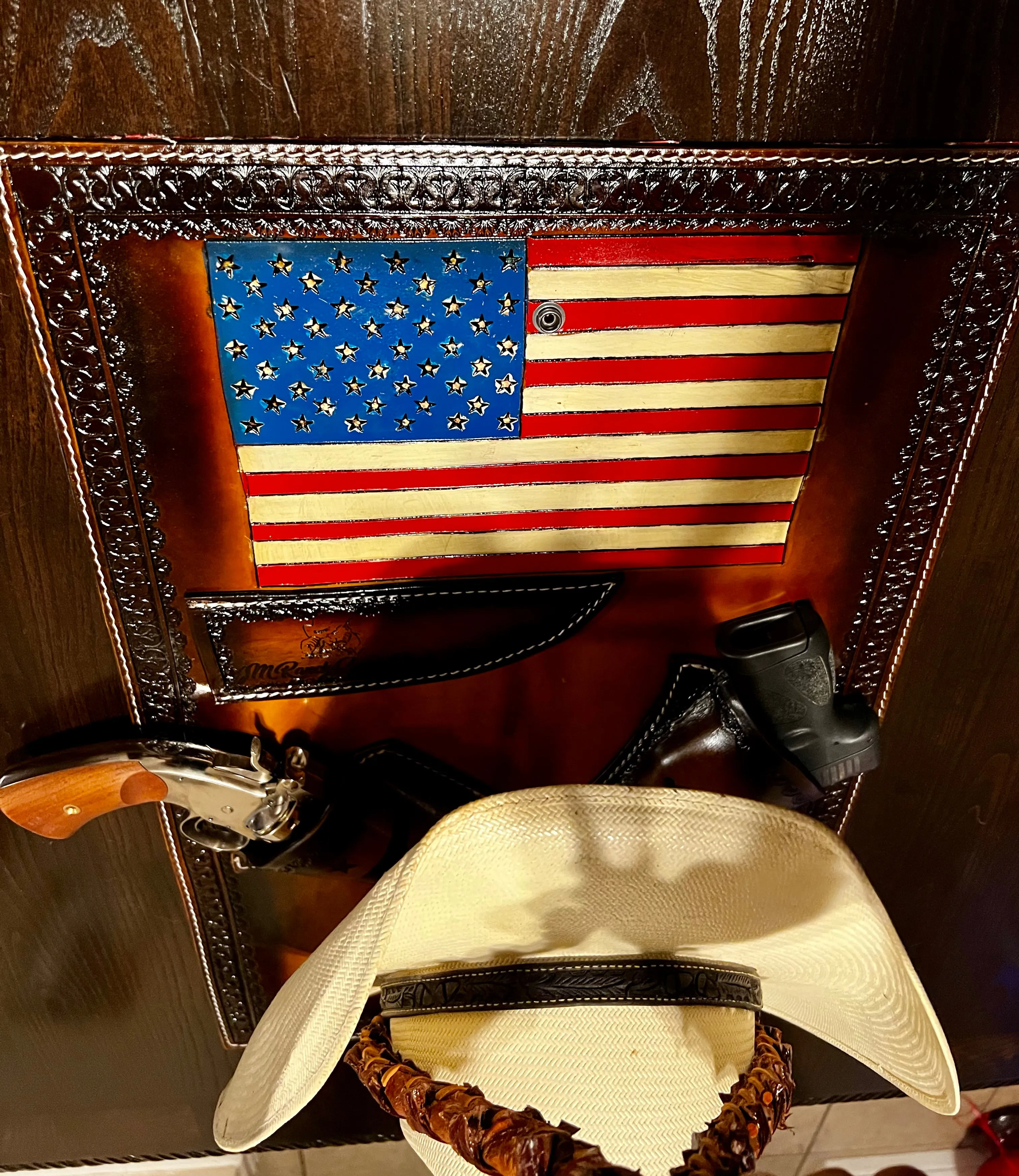 Jesse Marroquin’s Red, White, & Blue Edition Gun Holster Cowboy Hat Rack.